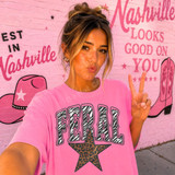 FERAL DTF transfer in zebra print lettering with a leopard print star on a pink shirt