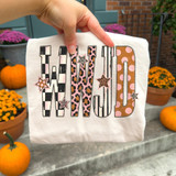 WWJD faith DTF transfer with checkered, leopard print, striped, and polka dot pattern lettering accented with stars