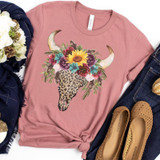 Leopard Bull Skull with Floral Headpiece Screen Print Transfer, pink T-shirt with a bull skull design adorned with colorful flowers and leaves.