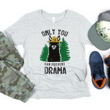 Only You Can Prevent Drama LlAma Youth Screen Print Heat Transfer T-shirt, featuring a llama wearing a yellow hat with the words 'Drama Llama,' green trees in the background, and black text.