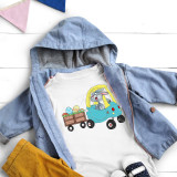 Cozy Coupe Easter Bunny Boys Sublimation Transfer, adorable grey bunny driving a colorful toy car with a wooden cart full of decorated Easter eggs.