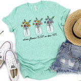 Where Flowers Bloom So Does Hope Screen Print Heat Transfer on a mint green T-shirt with floral design in jars.
