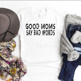 Good Moms Say Bad Words Sublimation Transfer, white t-shirt with black text design showcasing humorous message.
