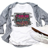 F-Bomb Mom Dark Sublimation Transfer, a humorous and colorful design on a white t-shirt, with a gray shirt and white sneakers placed around it.