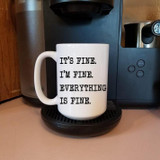It's fine I'm fine Everything is Fine Sublimation Transfer, white coffee mug with black text on a coffee machine.