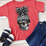 Pineapple Skull With Sunglasses YOUTH Screen Print Heat Transfer, image of a red youth t-shirt with a graphic of a skull wearing sunglasses and a pineapple texture on top.