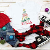 Christmas Tree Word Art Sublimation Transfer, festive Christmas design on white T-shirt with colorful words forming a tree shape.