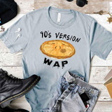 90's Version WAP FINAL STOCK Screen Print Heat Transfer T-shirt with a potato graphic, laid out on a wooden surface with accessories.
