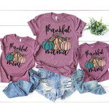 Thankful Mini Pumpkins YOUTH Screen Print Heat Transfer, set of three mauve T-shirts with fall-themed pumpkin designs and the words 'Thankful' and 'Mama' printed on them.