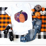Halloween Pumpkin Sublimation Transfer, design of a colorful pumpkin with purple and orange hues, displayed on a white T-shirt for Halloween decoration.
