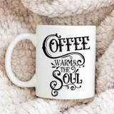 Coffee Warms The Soul Sublimation Transfer, a white ceramic mug with black artistic text design.