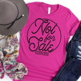 Not For Sale Screen Print Transfer T-shirt, pink casual t-shirt with black text design, along with a gray hat, floral scarf, and distressed denim jeans.
