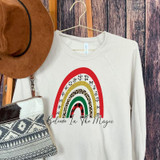 Believe In The Magic Screen Print Heat Transfer, printed on a white sweatshirt with a colorful rainbow and the text 'Believe In The Magic'.
