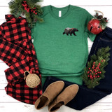 Blank Bear HAT/POCKET Screen Print Heat Transfer, green t-shirt with bear graphic, surrounded by festive Christmas decorations, plaid shirt, jeans, and boots.