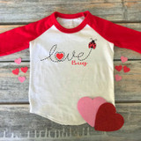 Love Bug Sublimation Transfer, red and white children's shirt with love bug and hearts design.