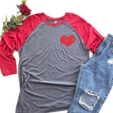 Red Heart Metallic HAT/POCKET Screen Print Heat Transfer on a casual grey and red raglan T-shirt with ripped jeans and a rose, lifestyle use.