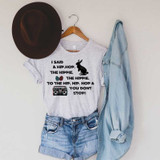 I Said A Hip Hop Sublimation Transfer, casual clothing setup with a graphic T-shirt, denim shorts, a denim shirt, a hat, and a hanger.