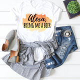 Alexa Bring Me Beer Sublimation Transfer on a white t-shirt, with casual outfit including distressed jeans, gray shoes, and accessories, laid out on a white wooden background with a potted plant and a notebook.