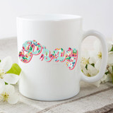Pray Sublimation Transfer, colorful floral design on white ceramic mug featuring the word 'Pray' in vibrant colors.