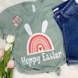 Hoppy Easter Rainbow Screen Print Heat Transfer, colorful rainbow with bunny ears and heart in the center on a green T-shirt.