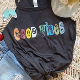 Good Vibes Hippie Screen Print Heat Transfer, black t-shirt with colorful peace sign and hand peace symbols.