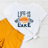 Life Is Better At The Lake Sublimation Transfer T-Shirt, white t-shirt with a colorful sunset and lake graphic design.