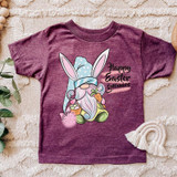 Happy Easter Gnomies YOUTH Screen Print Heat Transfer, kids' t-shirt featuring a cute gnome with bunny ears, holding carrots, with Easter and spring design.