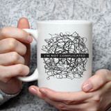 I'm Not Complicated Sublimation Transfer, white ceramic mug with tangled black line art and the phrase 'I'm Not Complicated' printed on it.