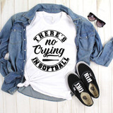 No Crying In Softball Sublimation Transfer, white T-shirt with a bold black text design, layered with a denim jacket, paired with black Vans sneakers and sunglasses, on a light wooden surface.