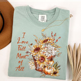 I Love Fall Most Of All Screen Print Heat Transfer, a design featuring sunflowers, pumpkins, and fall leaves on a light green sweatshirt.