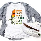 Pawpaw Is My Name Fishing Is My Game sublimation transfer T-shirt, featuring a fish wearing sunglasses and a cap with the text overlays.