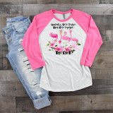 Trouble When We're Together Flamingos Sublimation Transfer, pink flamingo graphic with flowers and humorous quote on a women's raglan shirt.