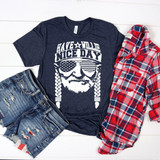 Have A Willie Nice Day ADULT Screen Print Heat Transfer, a dark blue T-shirt with a graphic design featuring a man's face with sunglasses, braids, and the American flag pattern on the sunglasses.
