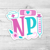 NP Die Cut Sticker, colorful medical-themed die cut sticker with heart, pills, syringe, and flower designs.