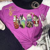 Villain Lattes DTF Transfer, colorful cartoon-style Halloween-themed drink illustrations on purple T-shirt.