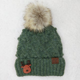 Reindeer Leather Patch, green knitted winter hat with faux fur pom-pom on top.