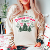 Griswold Christmas Tree Farm Screen Print Heat Transfer, a festive Christmas-themed heat transfer design with trees and holiday text, worn on a sweatshirt.