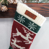 Custom Text Brown Leather Patch Christmas Stocking, Christmas sock with Christmas tree and reindeer design, personalized with 'SAWYER' leather patch.