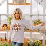 Here For The Rolls DTF Transfer, vibrant graphic design with the phrase 'Here For The Rolls' on a woman's sweatshirt in a greenhouse setting.