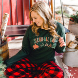 Sleigh All Day DTF Transfer, festive holiday design on a woman's sweatshirt featuring a sleigh and reindeer graphic.