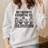 My Favorite Essential Oil Is Chloroform Sublimation Transfer, graphic of four bottles of chloroform essential oil on a white sweatshirt.