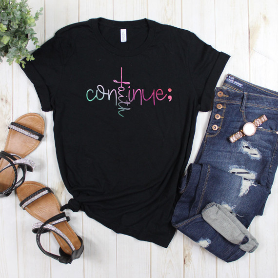 Continue semicolon DTF heat transfer, colorful graphic design on black T-shirt showcasing a semicolon and text, perfect for customized clothing.