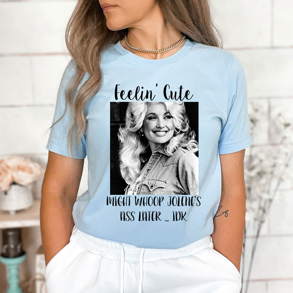 Feelin' Cute DTF Heat Transfer, humorous graphic T-shirt design featuring a woman with text and an image.