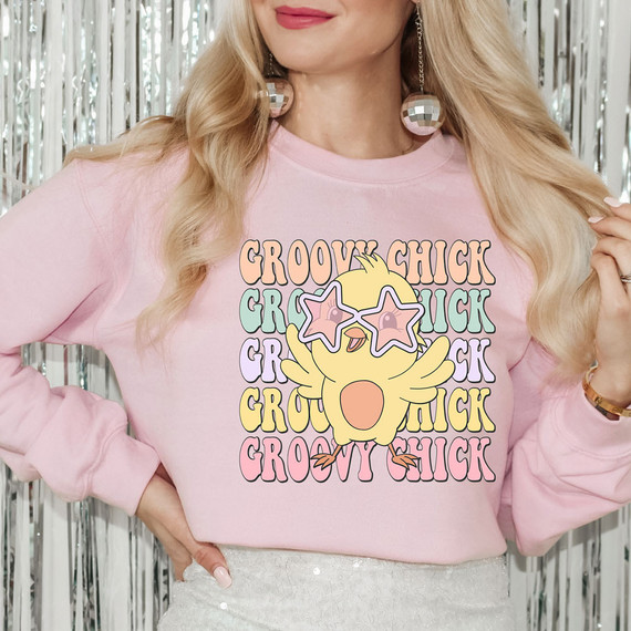 Groovy Chick DTF Heat Transfer, colorful cartoon chick wearing star-shaped sunglasses on pink sweatshirt.