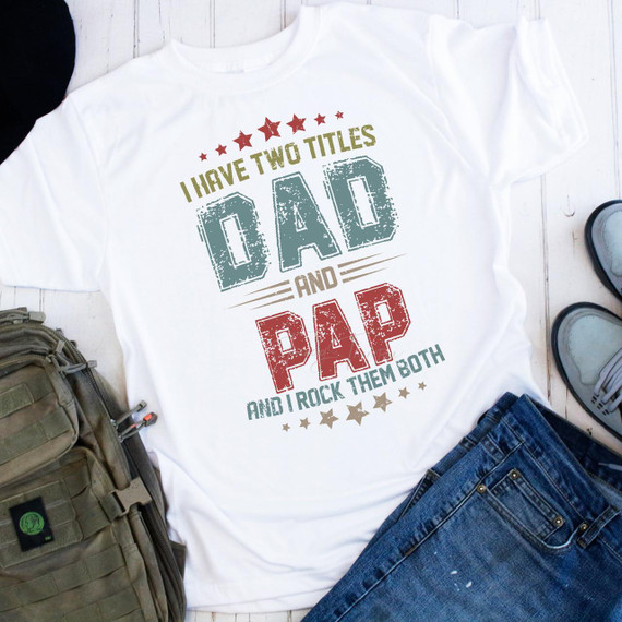 Product T-Shirt, T-shirt with print 'I Have Two Titles Dad and Pap and I Rock Them Both' for sublimation transfer.