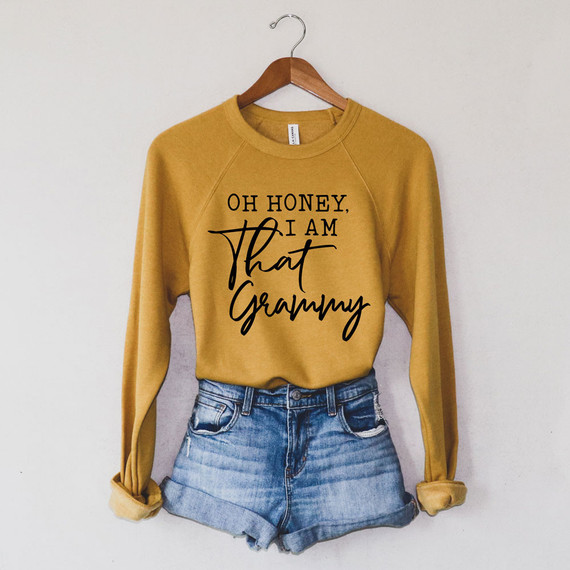 Oh Honey, I Am That Grammy DTF Heat Transfer, yellow sweatshirt with black graphic text design on the front.