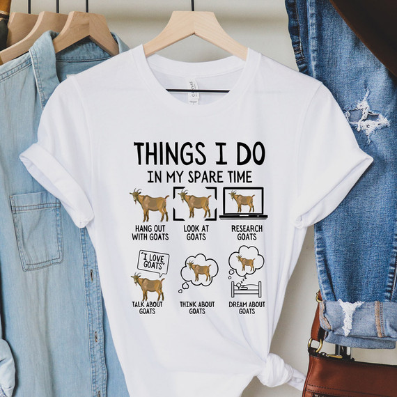 Things I Do In My Spare Time Goats DTF Heat Transfer, white t-shirt with humorous goat-themed graphics and text about spending spare time with goats.