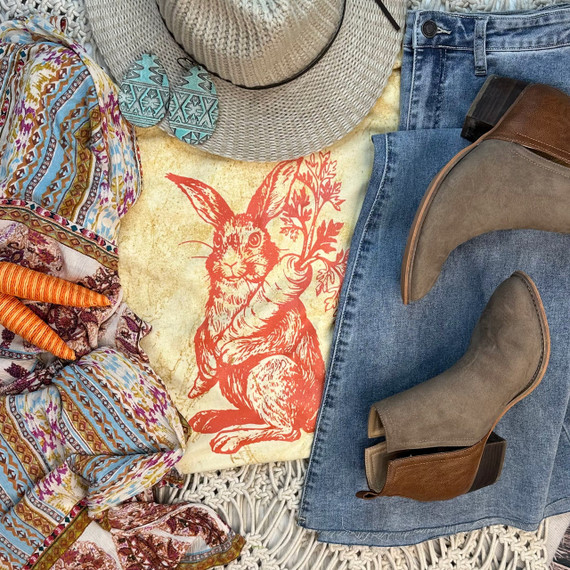 Orange Metallic Bunny Screen Print Heat Transfer, a vibrant orange bunny holding a carrot with leafy top, printed on a vintage-style t-shirt.