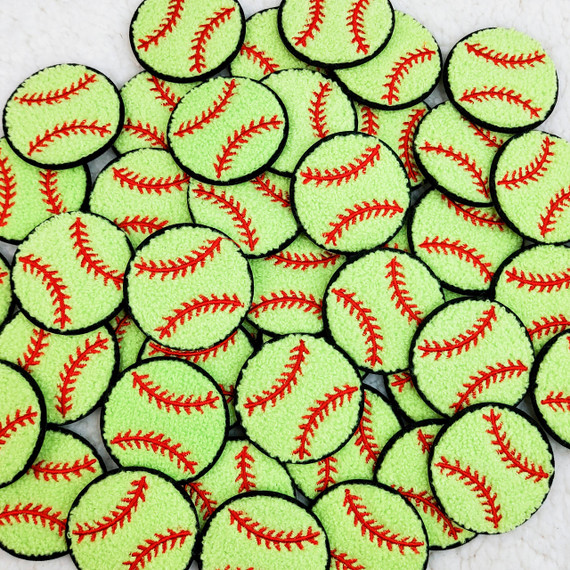 Softball Chenille BALL Patch 2 inches, a collection of small, round, vibrant green patches with red stitched lines resembling a baseball design.