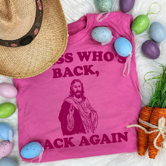 Guess Who's Back Maroon Ink DTF Heat Transfer, pink t-shirt with Jesus illustration and bold maroon text